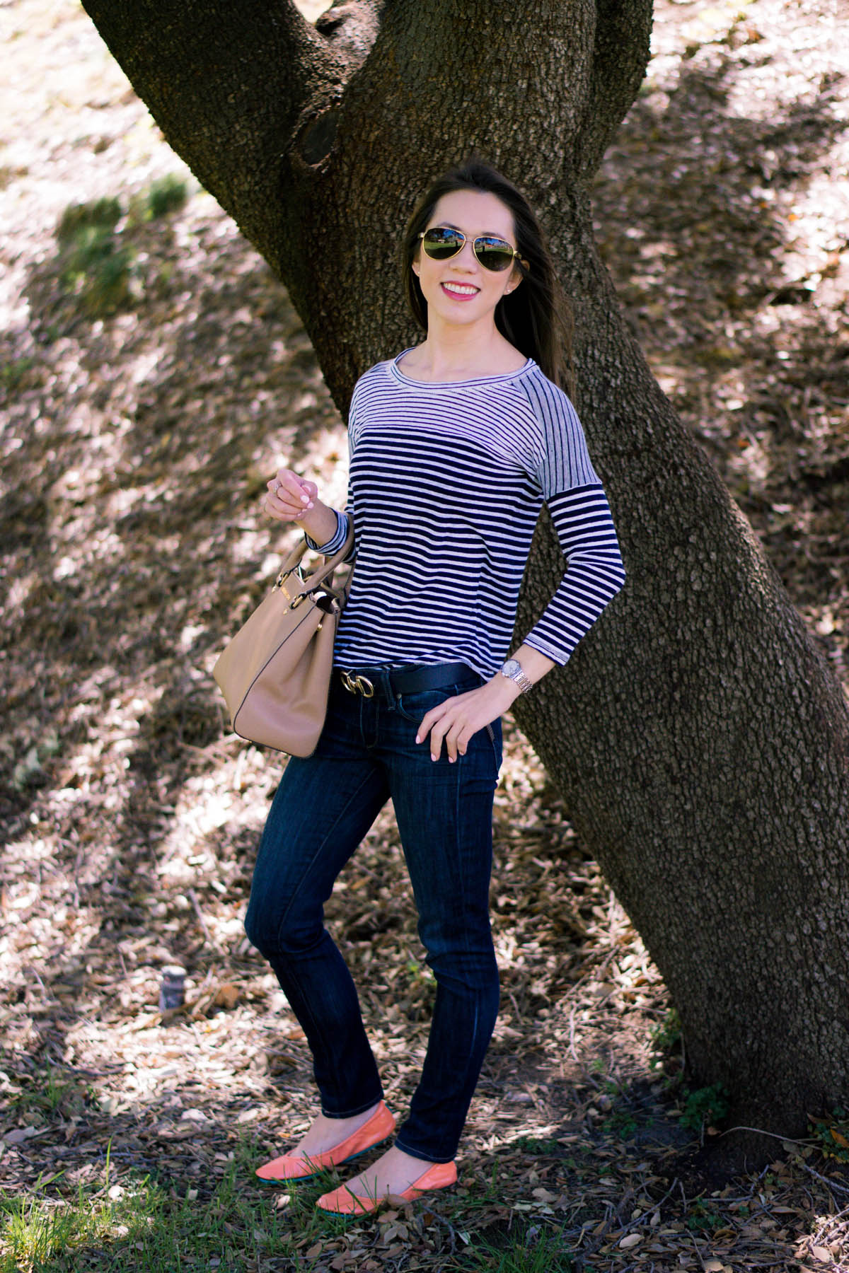 Petite fashion | Petite Style | Easy casual outfit inspiration | Tieks coral patent ballet flats. J. Crew striped tee. Paige denim. Michael Kors Sutton handbag