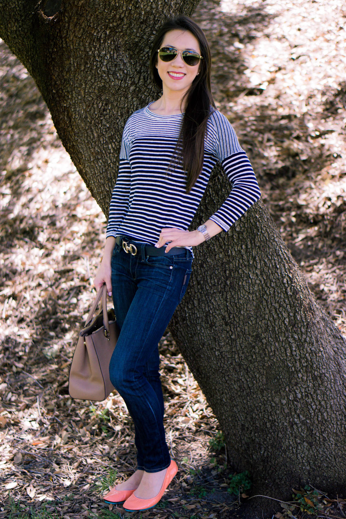 Petite fashion | Petite Style | Easy casual outfit inspiration | Tieks coral patent ballet flats. J. Crew striped tee. Paige denim. Michael Kors Sutton handbag