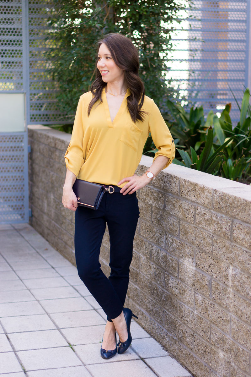 How to Wear Navy & Mustard Yellow together | Work outfit inspiration | Lush tunic blouse | Ann Taylor yellow ruffle blouse | Petite fashion and style blog | Banana Republic Sloan Pants | Gibson burgundy cardigan | Talbots reversible belt | Tory Burch wallet clutch | Office style | yellow and navy