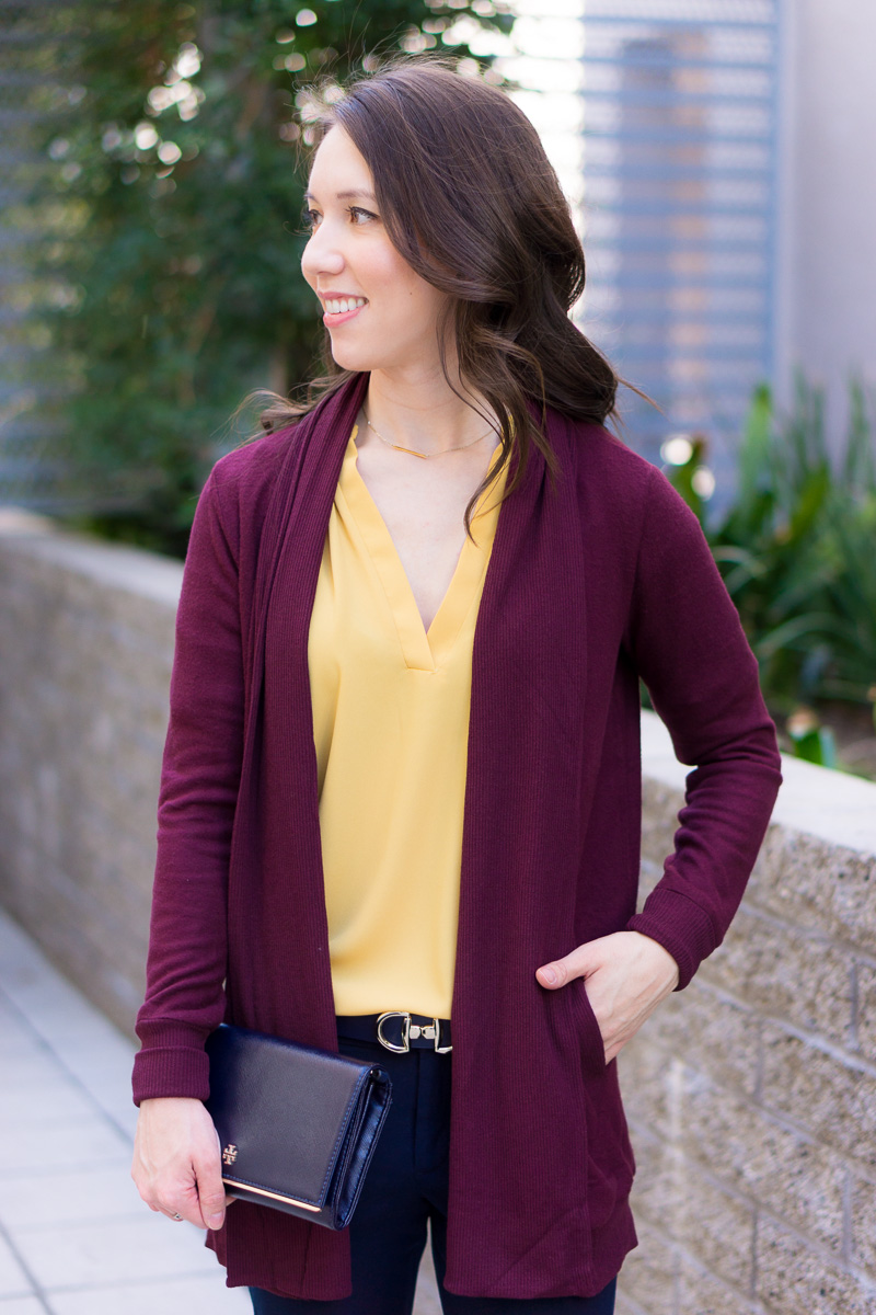 How to Wear Navy & Mustard Yellow together | Work outfit inspiration | Lush tunic blouse | Ann Taylor yellow ruffle blouse | Petite fashion and style blog | Banana Republic Sloan Pants | Gibson burgundy cardigan | Talbots reversible belt | Tory Burch wallet clutch | Office style | yellow and navy