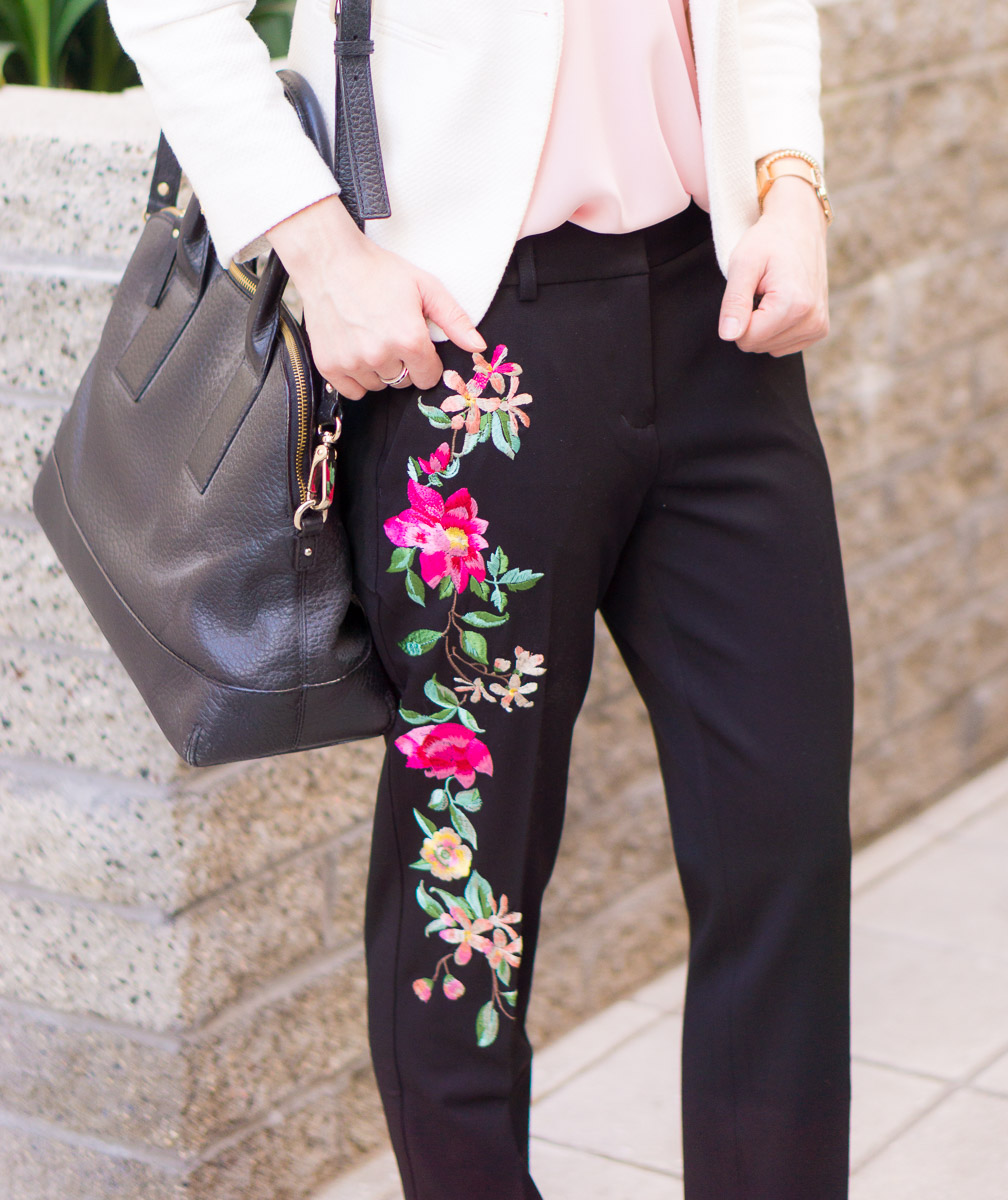 Two work outfits for early spring | Lavender pants | Blush pink high-waisted pants | Floral embroidered columnist black pants | Express petite fashion review | Petite style blog | Lush tunic blouse navy pink | Ann Taylor block sandals | Ivory heels | Springtime Summer outfit inspiration | rose gold bracelets accessories