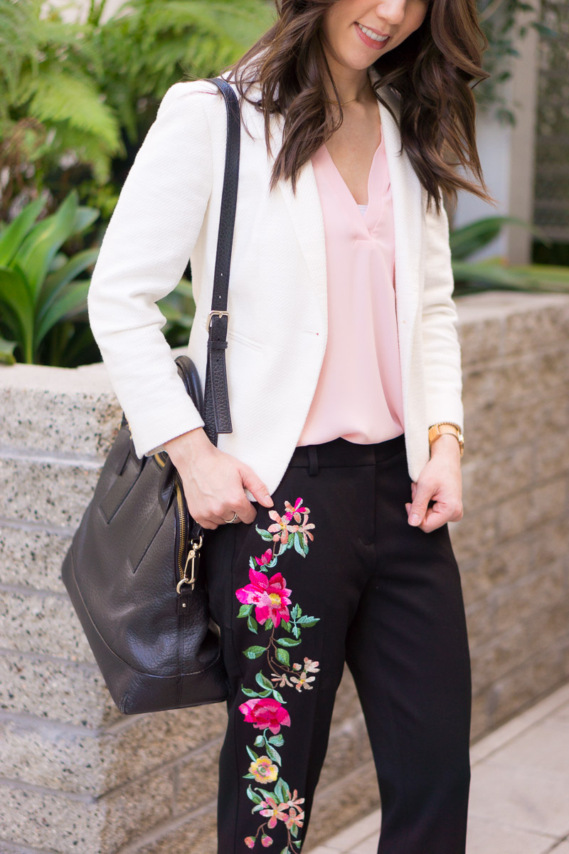 Two work outfits for early spring | Lavender pants | Blush pink high-waisted pants | Floral embroidered columnist black pants | Express petite fashion review | Petite style blog | Lush tunic blouse navy pink | Ann Taylor block sandals | Ivory heels | Springtime Summer outfit inspiration | rose gold bracelets accessories