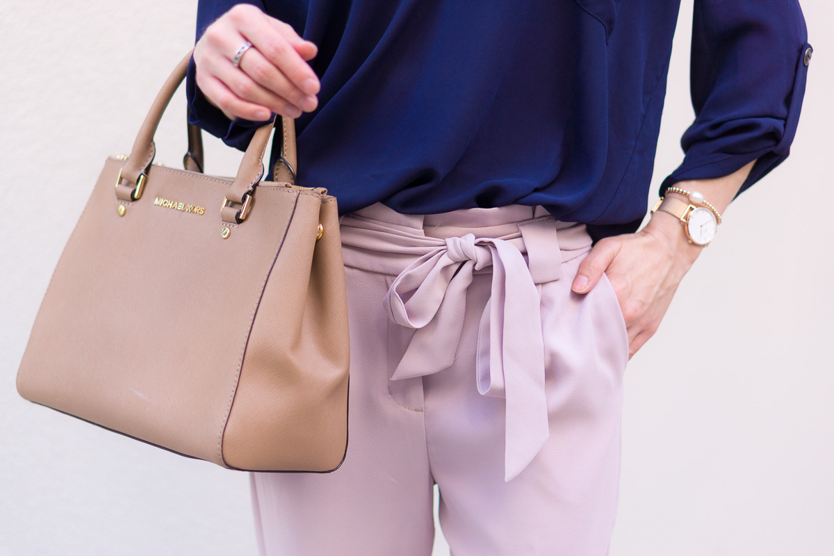 Two work outfits for early spring | Lavender pants | Blush pink high-waisted pants | Floral embroidered columnist black pants | Express petite fashion review | Petite style blog | Lush tunic blouse navy pink | Ann Taylor block sandals | Ivory heels | Springtime Summer outfit inspiration | rose gold bracelets accessories