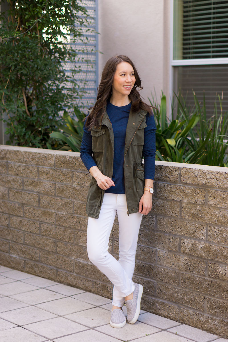 How to style a utility vest | women utility vest | Caslon olive green vest | navy vest | spring layers | summer layers | olive green striped tee brown tote bag | paige white denim navy olive green vest | FIGS longsleeve underscrub tee | FIGS scrubs review | M. Gemi Cerchio sneaker review | gray slip on sneakers | Aquatalia brown riding boots | waterproof boots review | petite fashion and style blog | capsule wardrobe advice