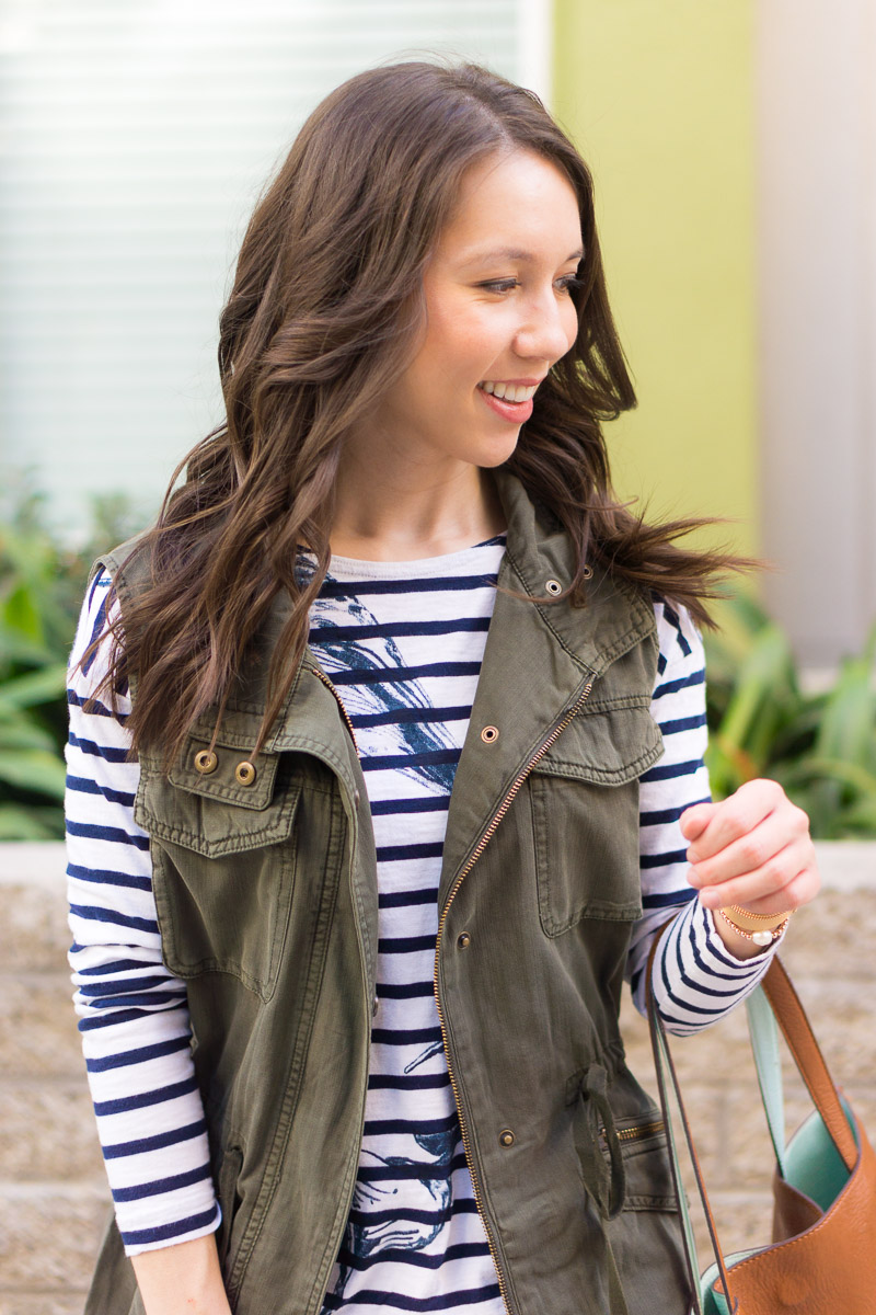 How to style a utility vest | women utility vest | Caslon olive green vest | navy vest | spring layers | summer layers | olive green striped tee brown tote bag | paige white denim navy olive green vest | FIGS longsleeve underscrub tee | FIGS scrubs review | M. Gemi Cerchio sneaker review | gray slip on sneakers | Aquatalia brown riding boots | waterproof boots review | petite fashion and style blog | capsule wardrobe advice